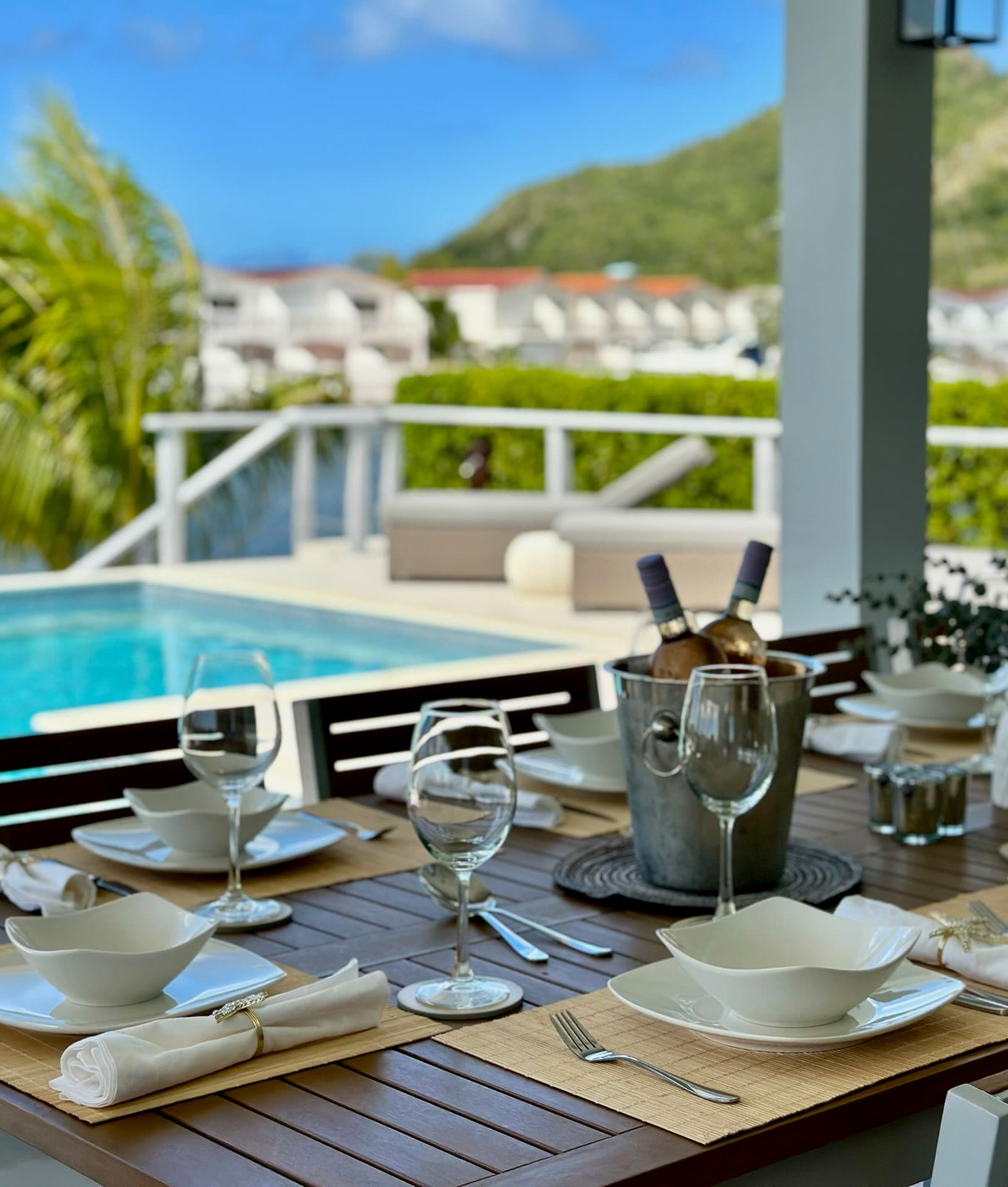 Poolside dining with a harbour view