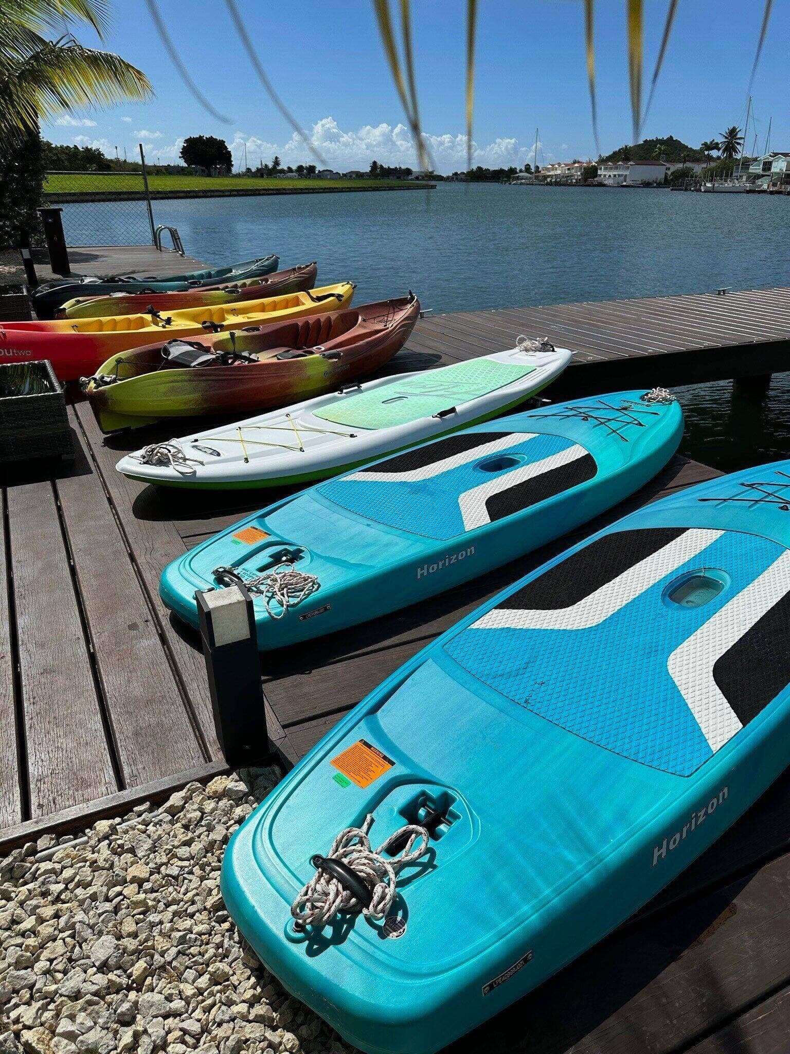 Kayaks and paddleboards, ready for adventures on the water