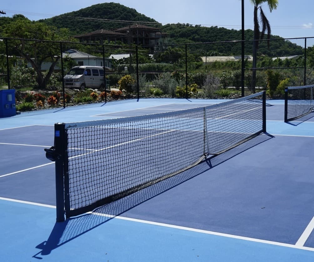 Floodlit pickleball courts at Jolly Harbour Sports Village